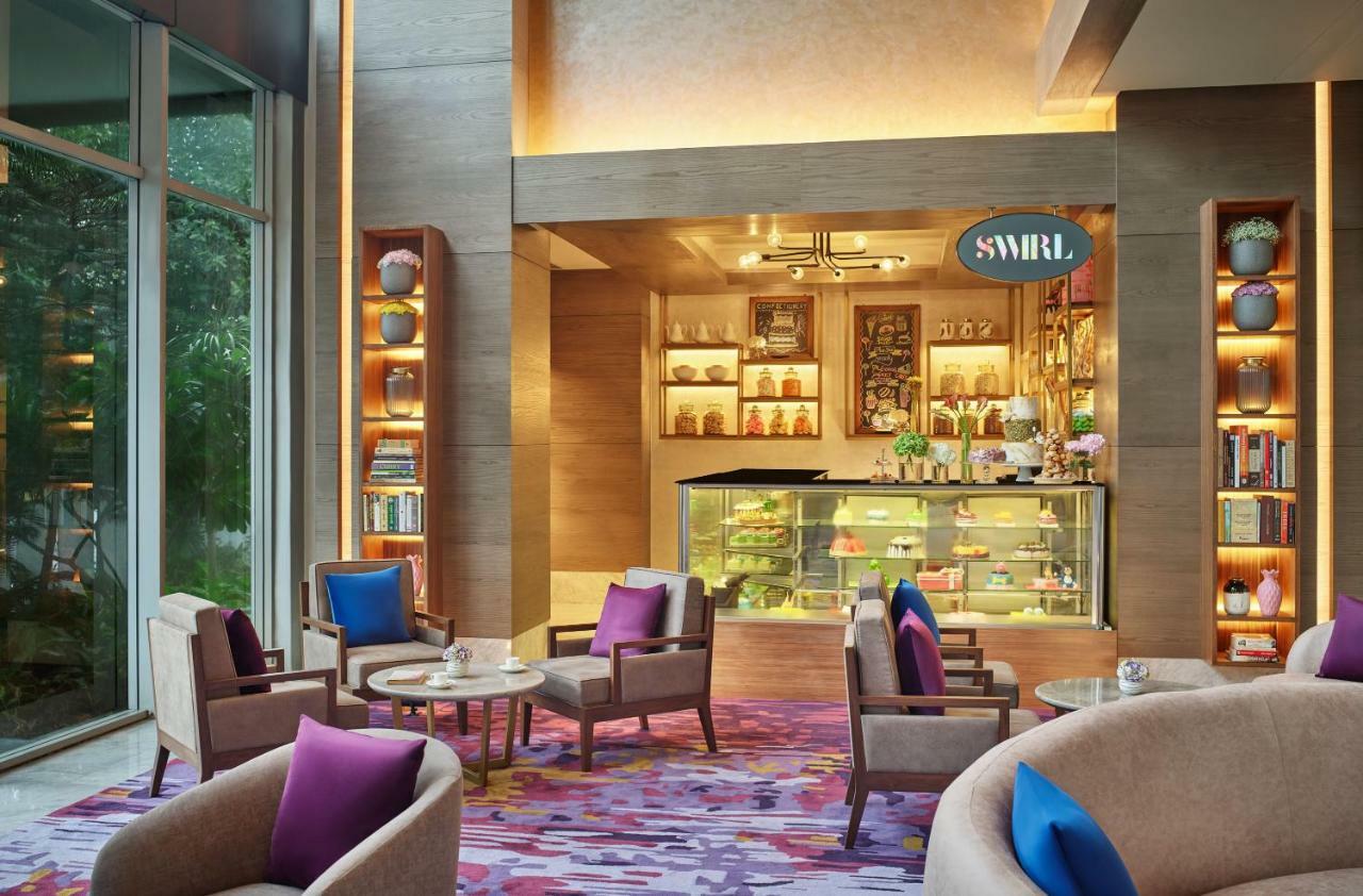 วิวันทา โกลกาตา อีเอ็ม บายพาส Hotel ภายนอก รูปภาพ The Swirl Lounge at the airport